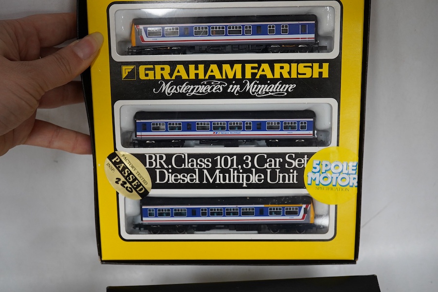 Four boxed Graham Farish N gauge railway Class 101 train packs; a BR Regional Railways 2-car DMU (8131), a Strathclyde 3-car DMU (814A), a BR 3-car DMU (8143) and a Network SouthEast 3-car DMU (8148). Condition - good.